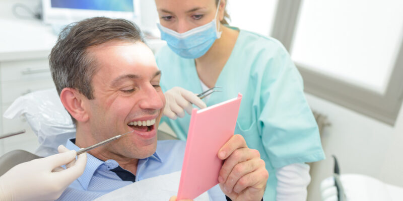 patient with mirror gap after tooth extraction