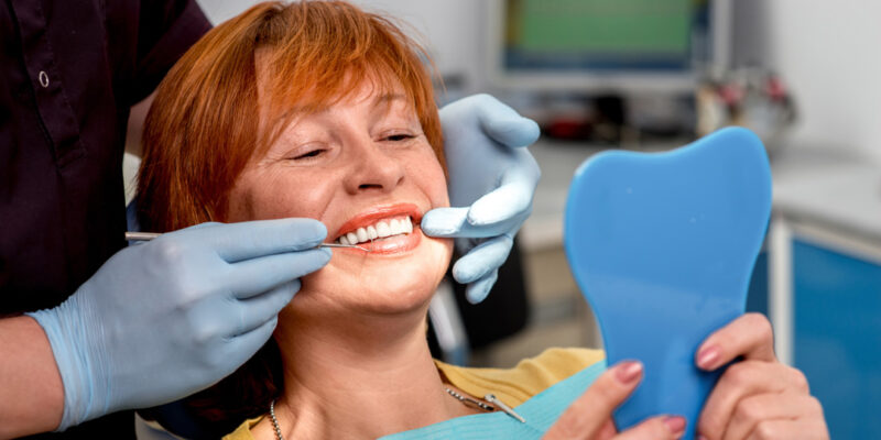 Senior woman in the dental office