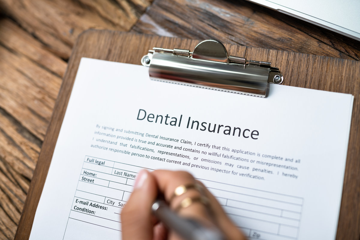 Dental Insurance Form On Desk. Dentist Teeth Service