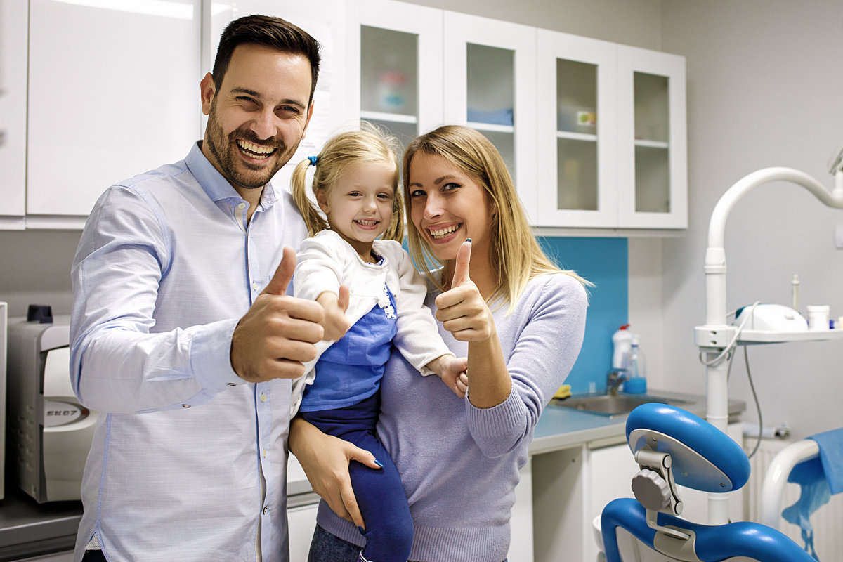 Cute blonde child first time in dental office.