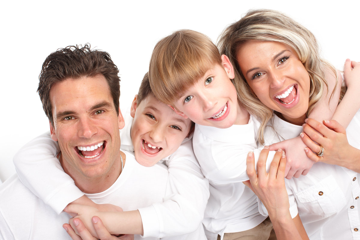 Happy family. Father, mother and children. Over white background