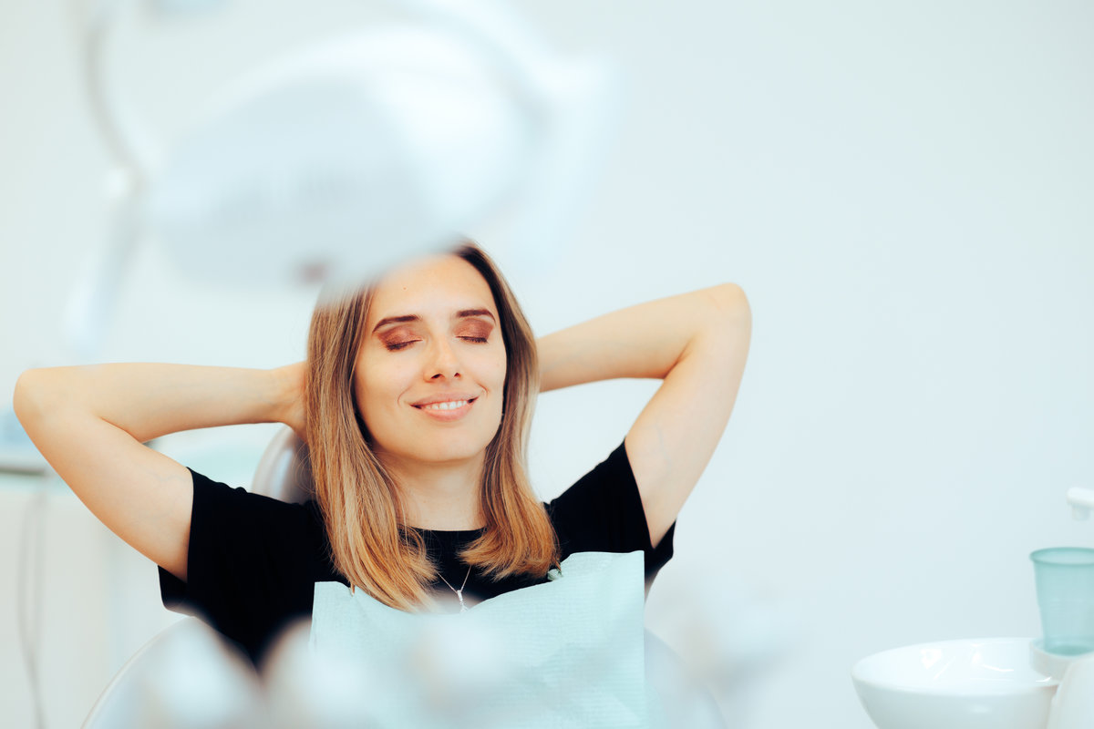 Woman relaxing in dental chair